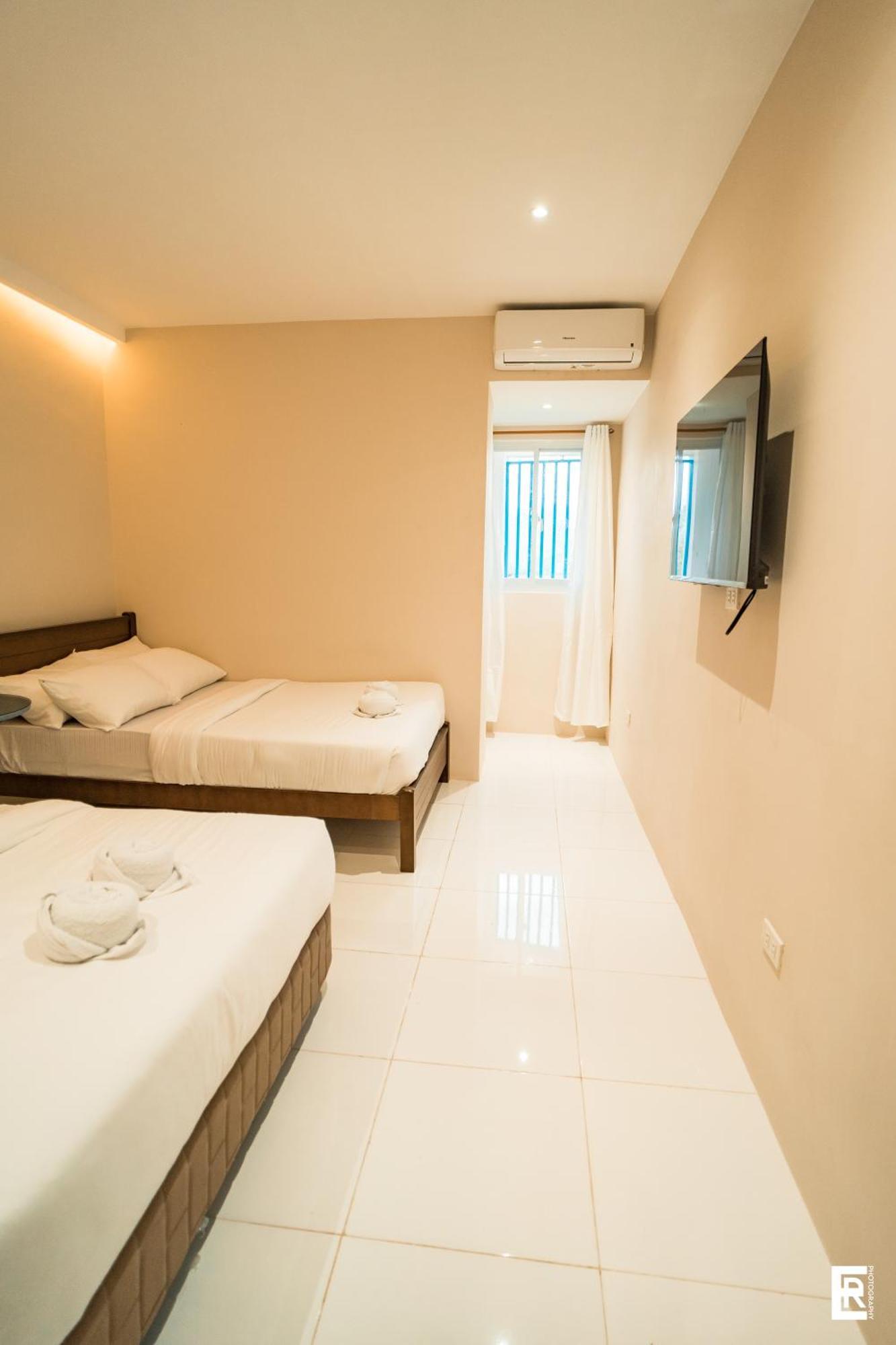 Bernese Resort Hotel Powered By Cocotel Ligao Pokoj fotografie
