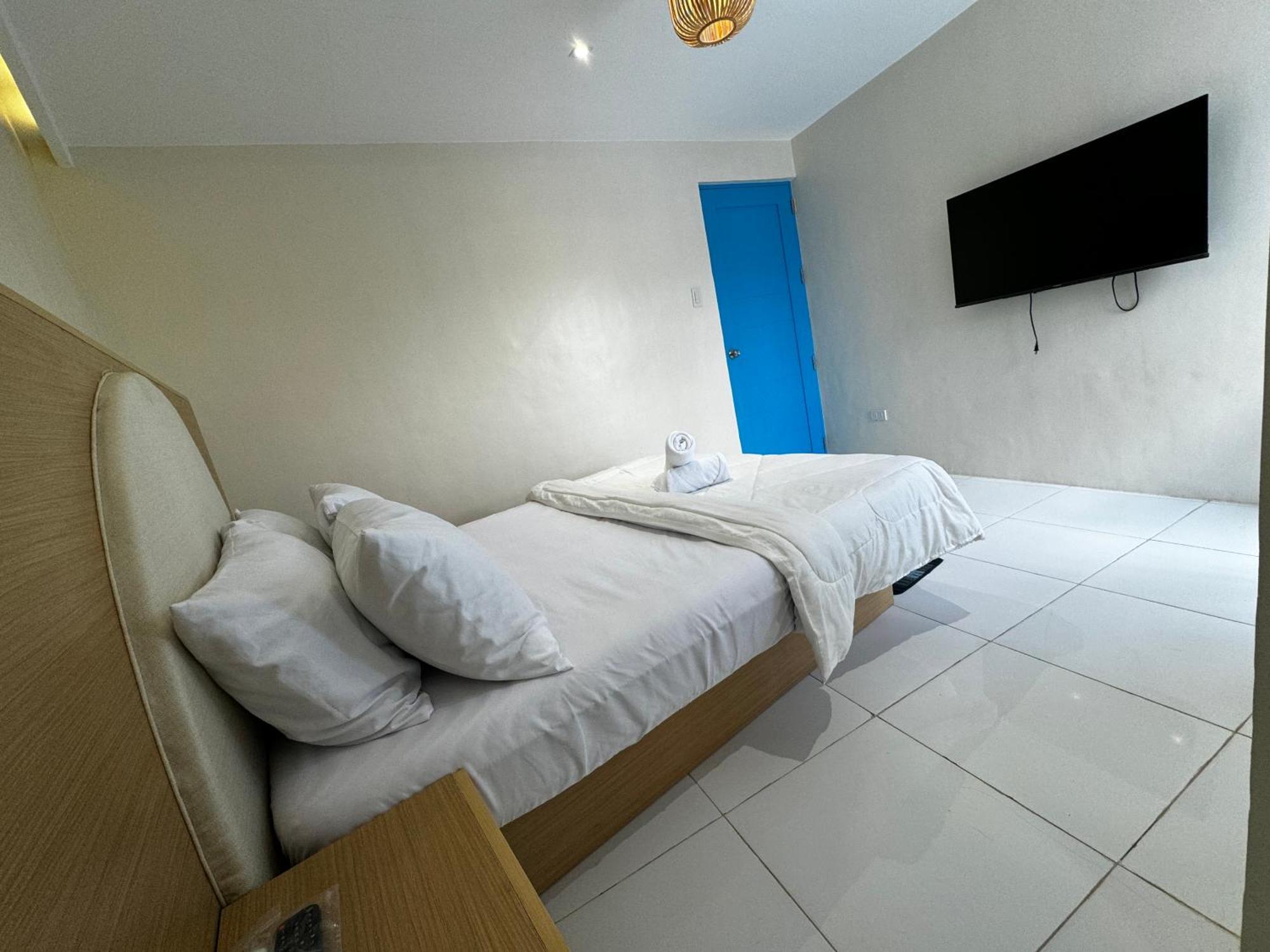 Bernese Resort Hotel Powered By Cocotel Ligao Pokoj fotografie